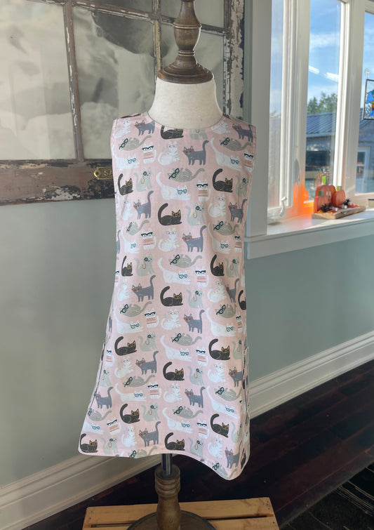 soft grey and pastel cats on child's apron
