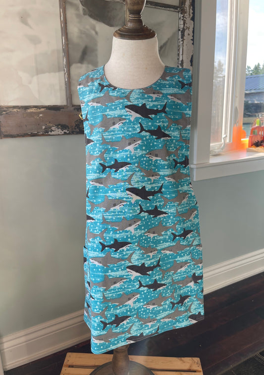 swimming sharks on child's apron